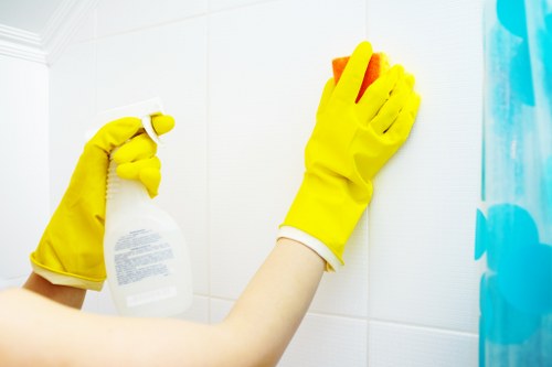 Supervisor reviewing workplace safety checklist during carpet cleaning