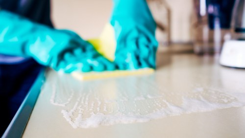 Deep cleaning a living room sofa in Crewshill for freshness and hygiene